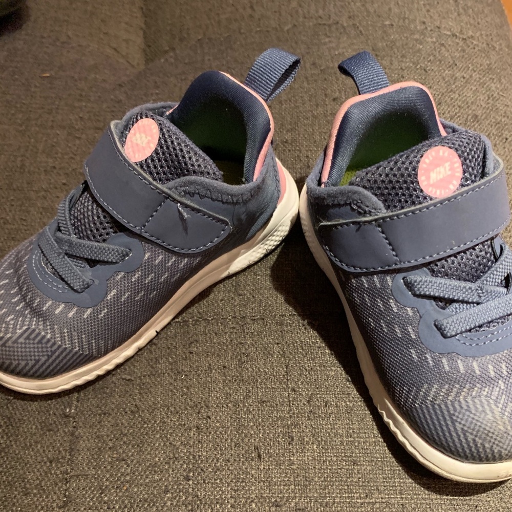 Blue and pink Velcro buckle Nike’s in a size 6.5